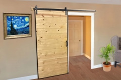 Goldberg-MP-J-Strap-barn-door-hardware-beige-wall-wood-floor