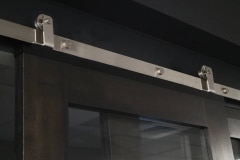 Stainless Steel hardware with top-mount hangers on office barn door