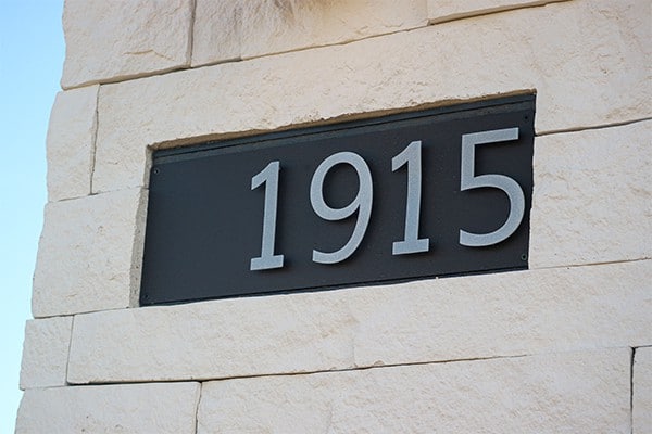 Goldberg Brothers house number sign on house exterior
